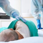 Photo shows man getting a colonoscopy